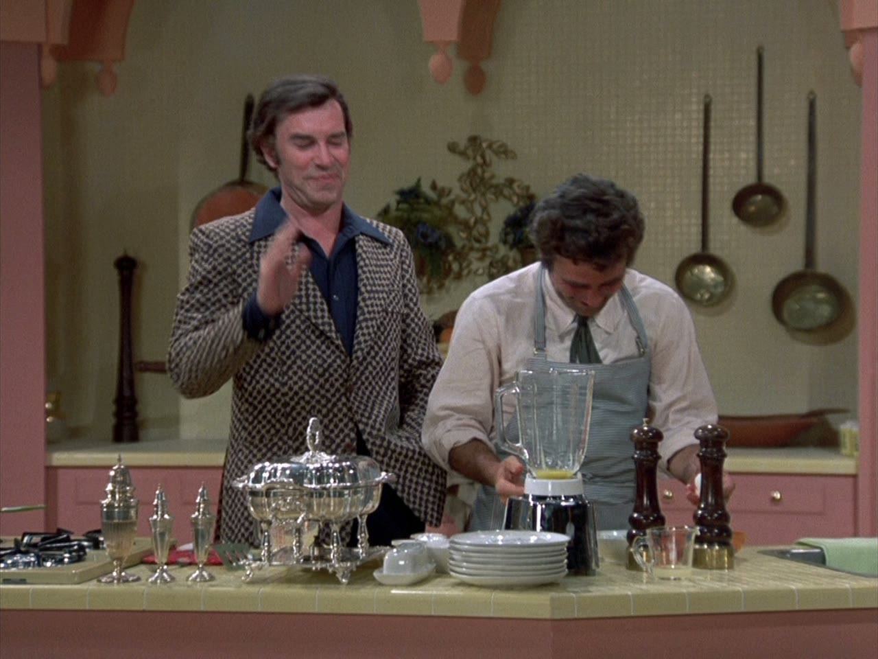Dexter Paris at the stove, the lieutenant beside him