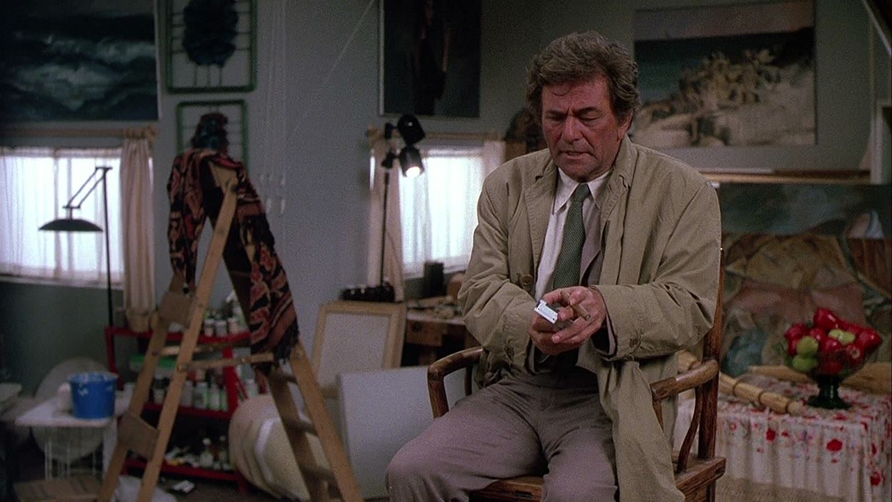 The lieutenant sits for a portrait and looks around while he is at it