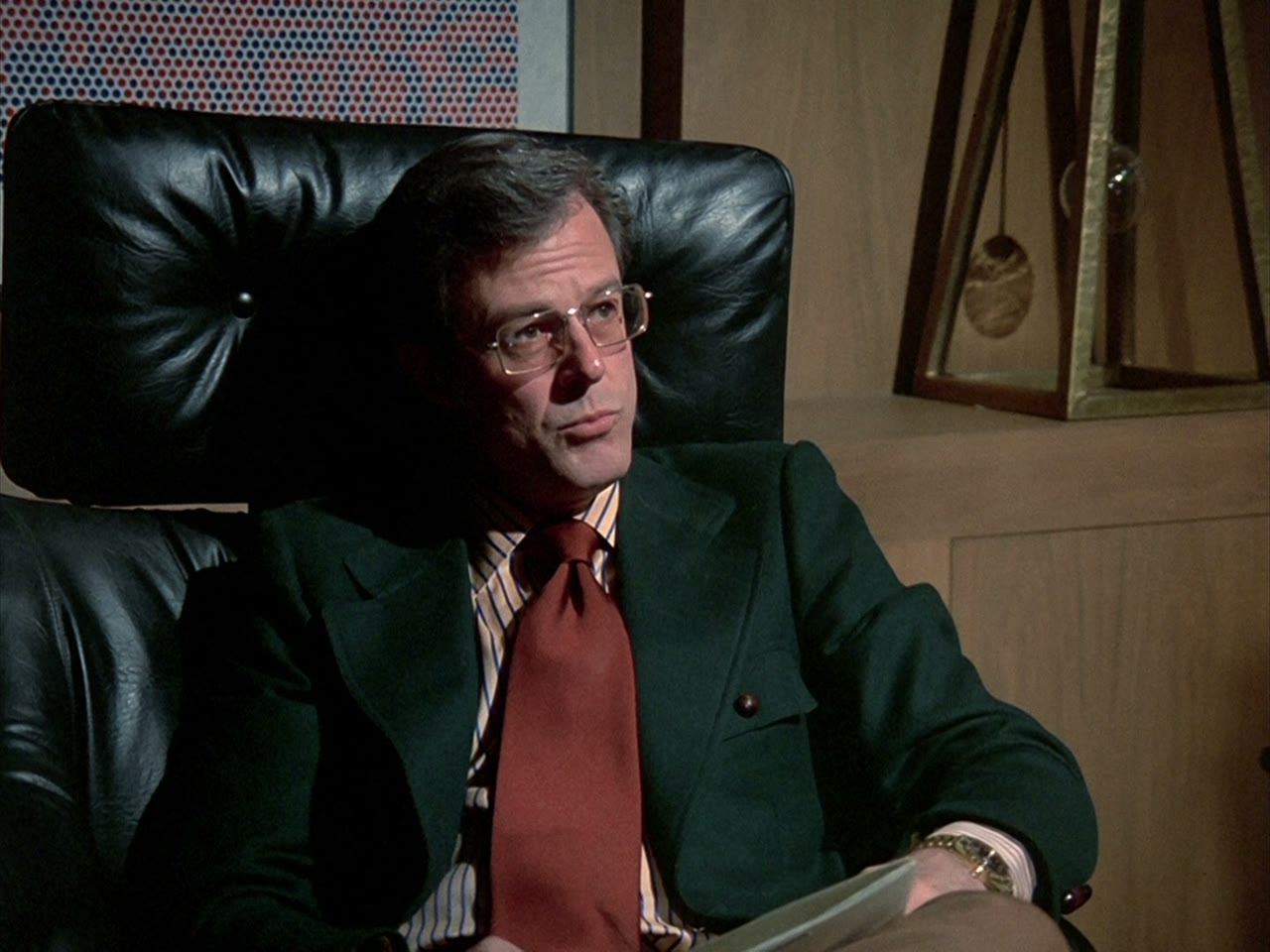 Private investigator Brimmer in the office where everything is under control