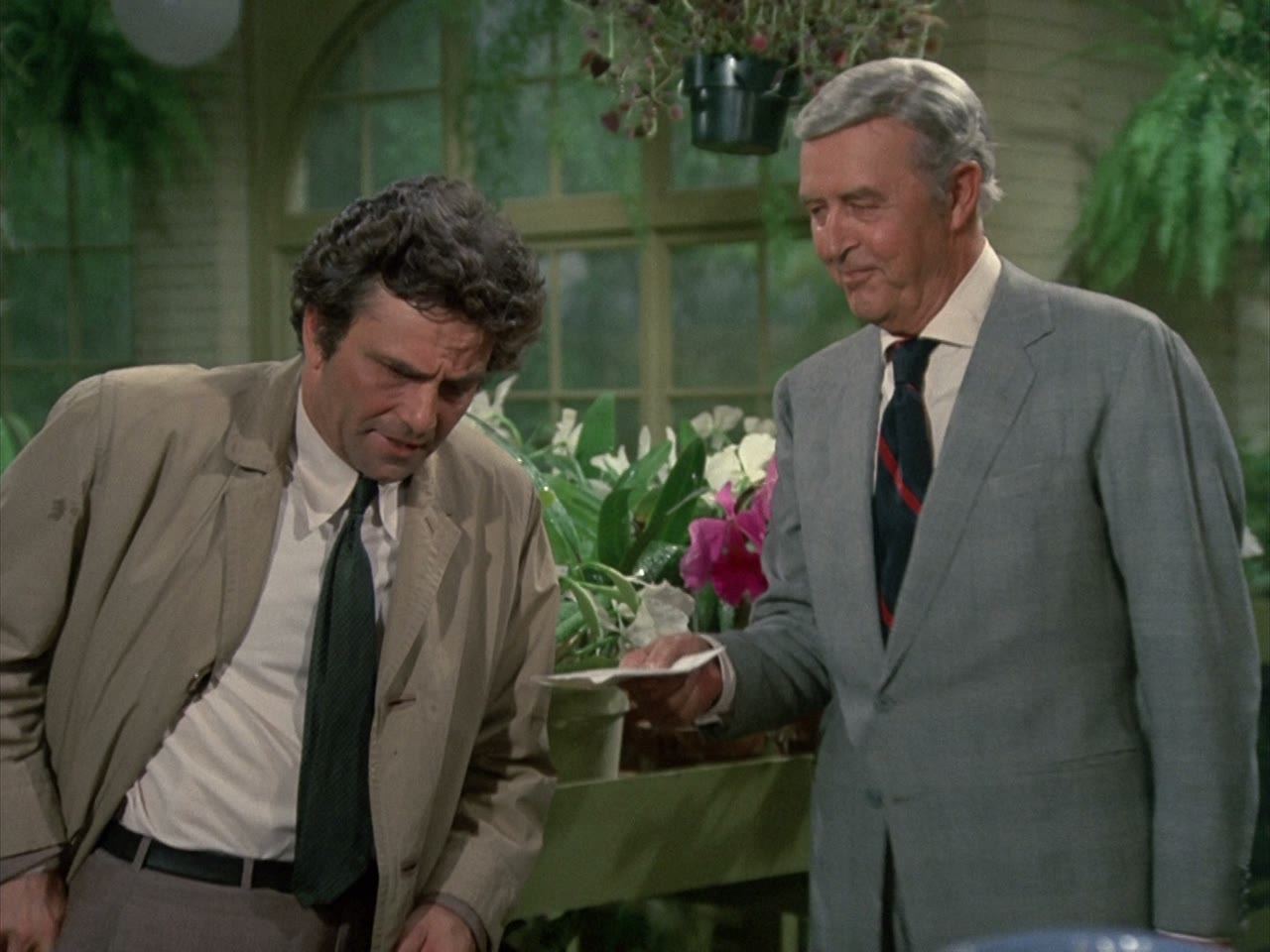 Jarvis Goodland shows the lieutenant his orchids
