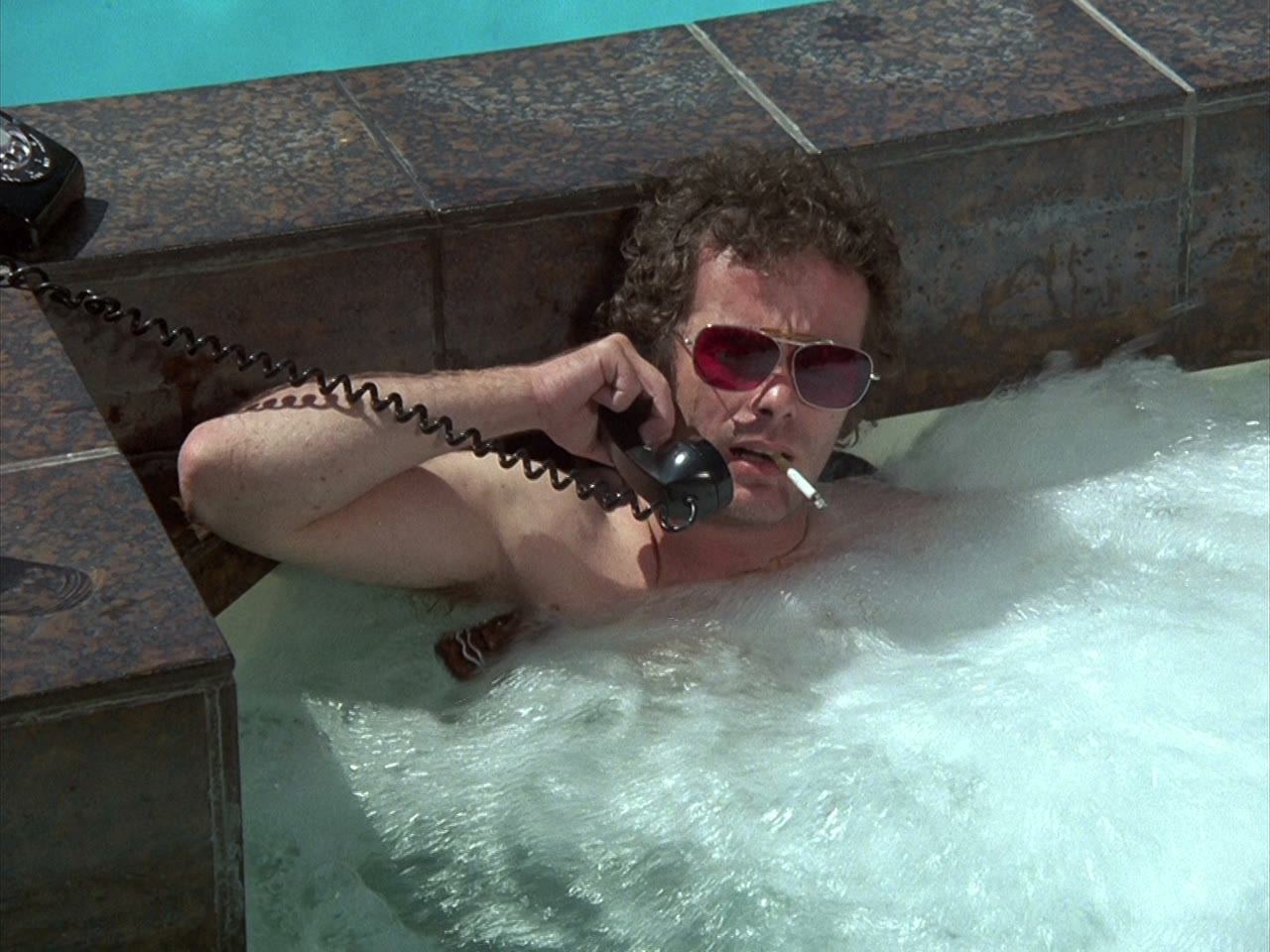 Eric Wagner takes a call in the jacuzzi, the last of his life