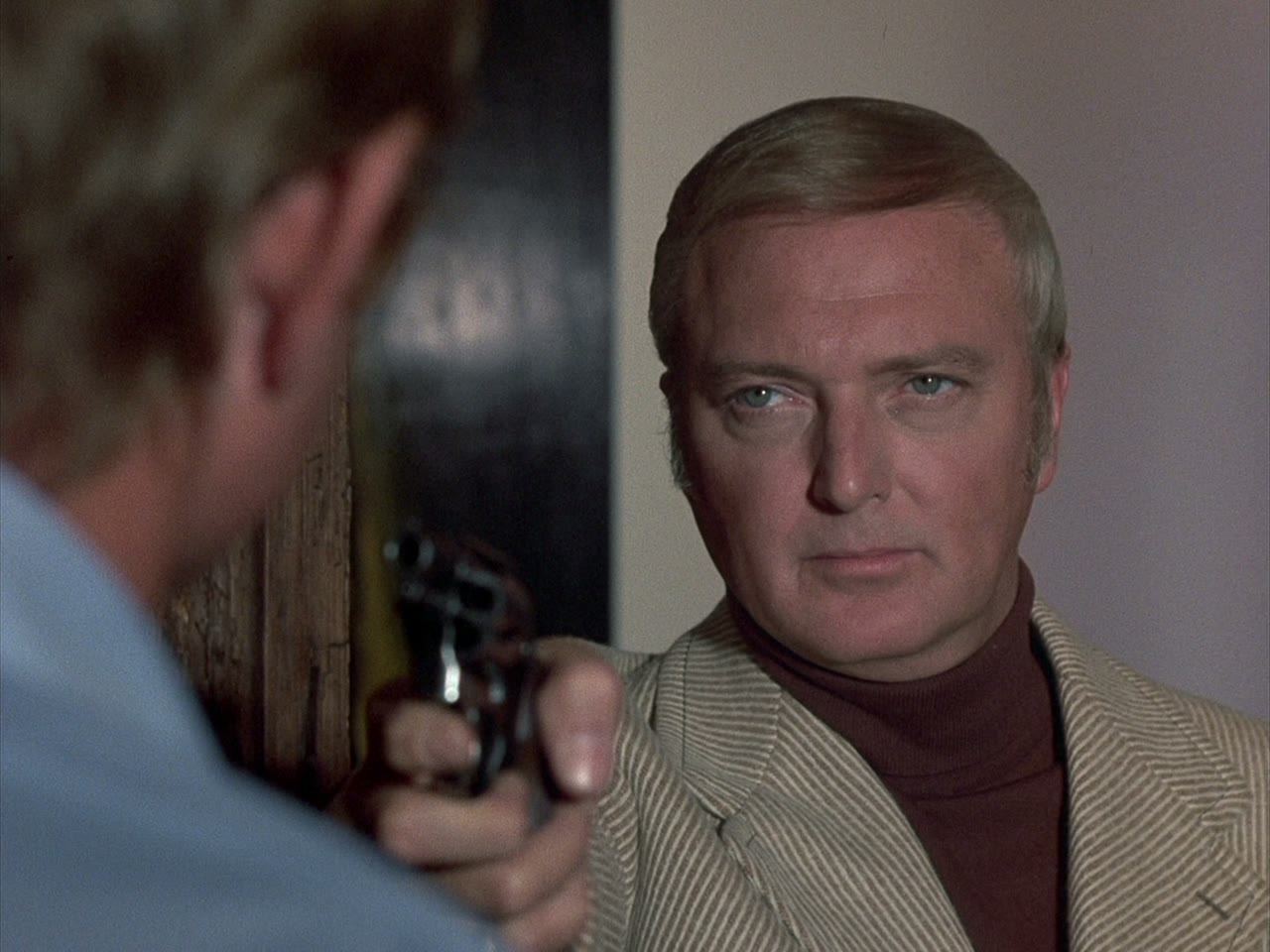 Ken Franklin points the gun at his co-author Jim Ferris