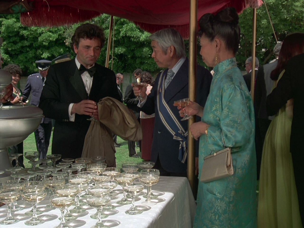A reception: the lieutenant in white tie and again out of place